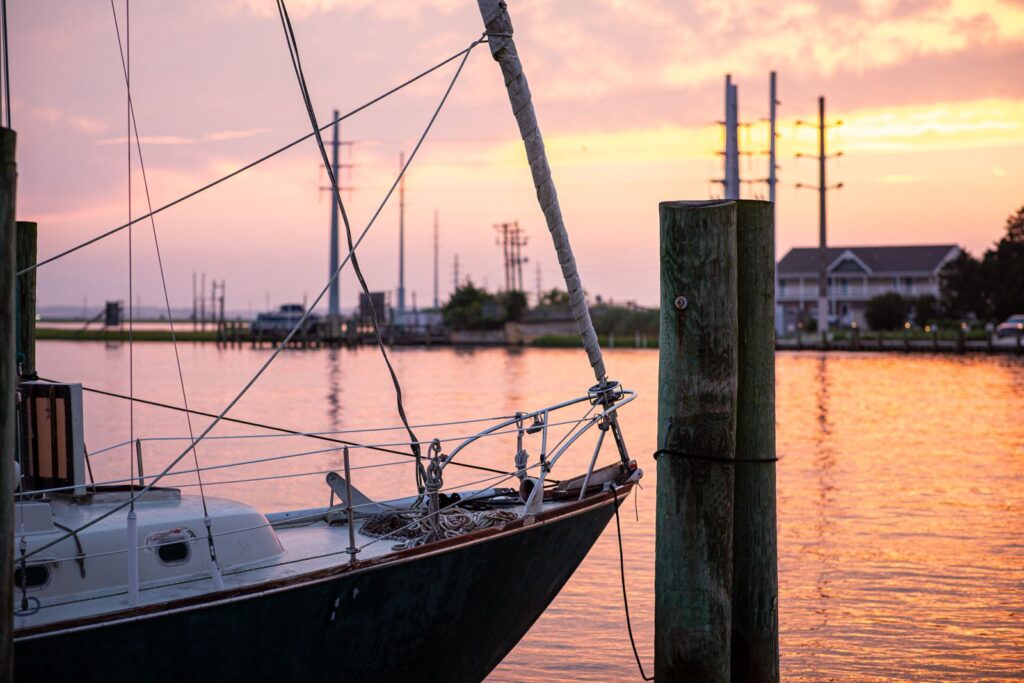 Sailboat moored in a small harbor at sunset on the Chesapeake Bay side